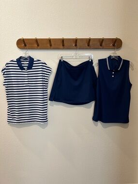 Nike Womens Golf Bundle
Tops = L
Skort = M
Bright Navy Blue/White Stripe